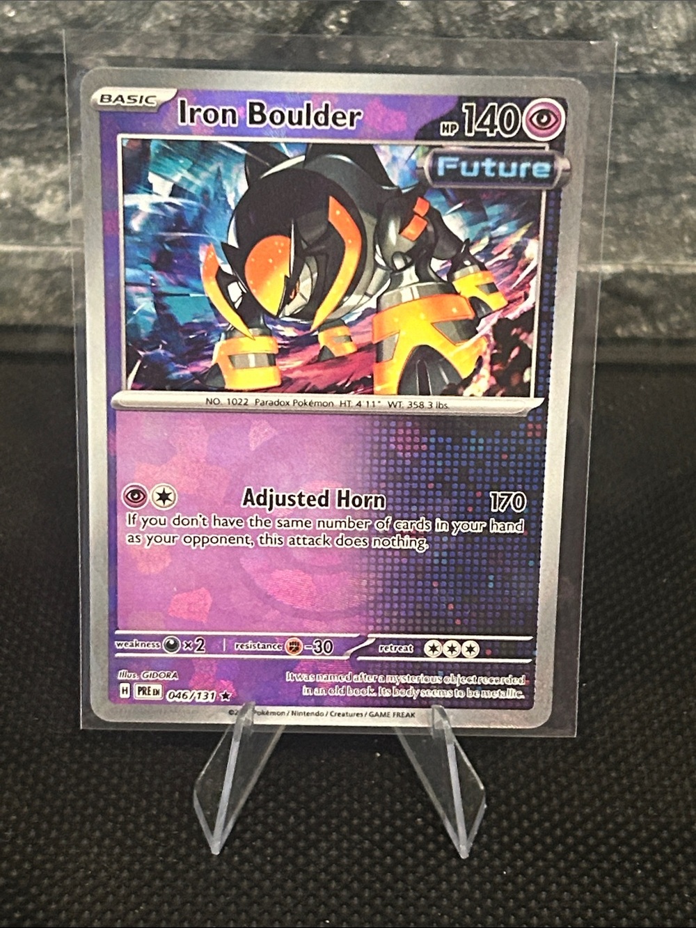 Pokemon Iron Boulder Pokeball 046/131 Holo from Prismatic Evolutions M/NM